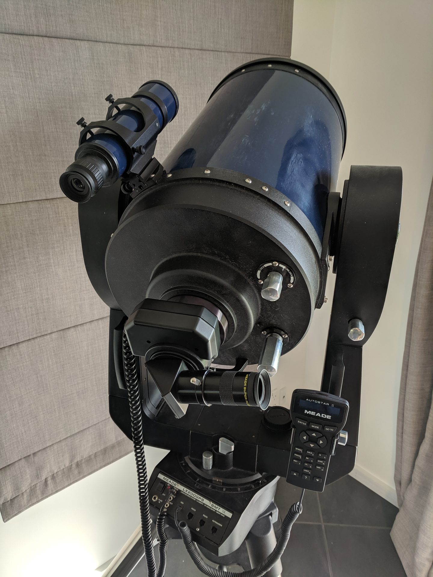 A Meade LX200 Schmidt-Cassegrain telescope on its fork mount with an Autostar handset